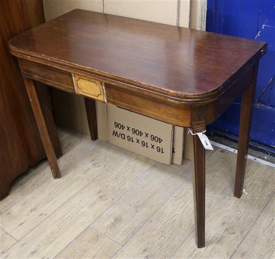 A mahogany tea table W.95cm